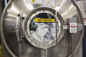 washing machine with hot water sign