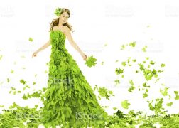 woman with dress made of green leaves