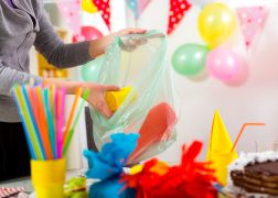 Woman cleans mess after the children's birthday