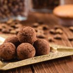 Truffle chocolate candies with cocoa powder