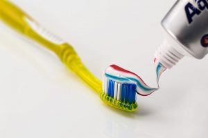 toothpaste on brush